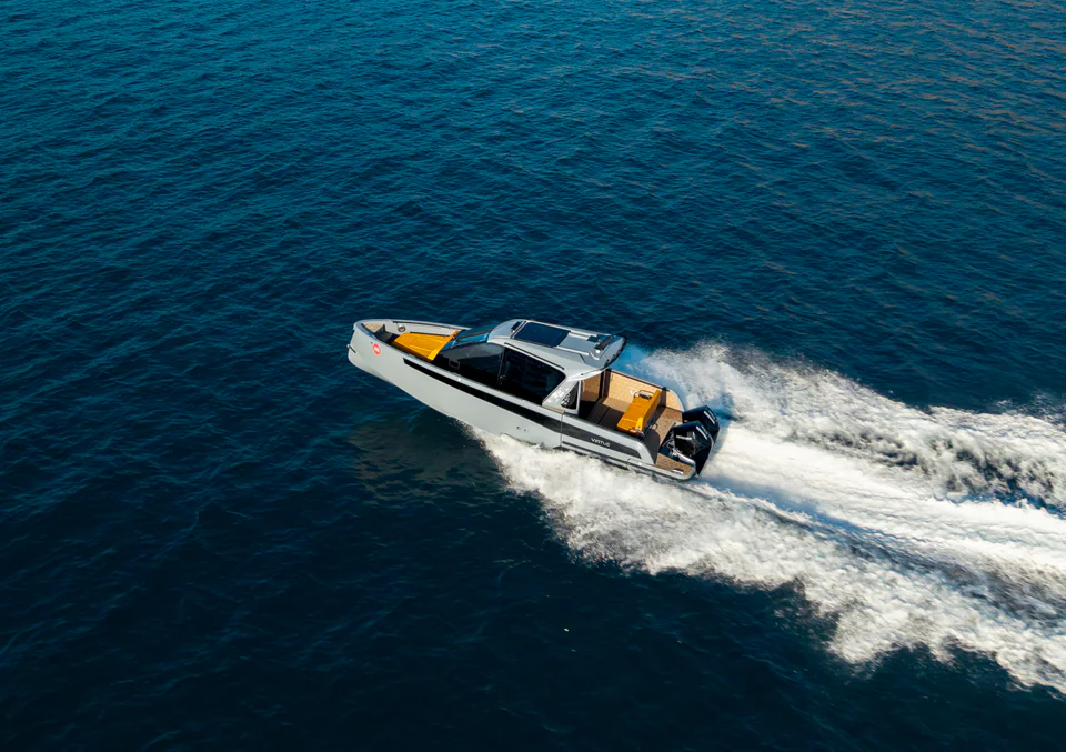 Motor yacht cruising across open water