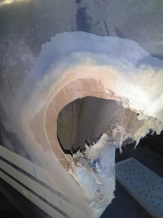 Damaged bow area opened and prepared for repair